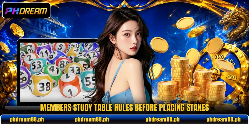 Members study table rules before placing stakes